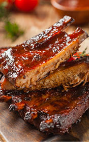 Roasted pork ribs. Served with Honey BBQ sauce.