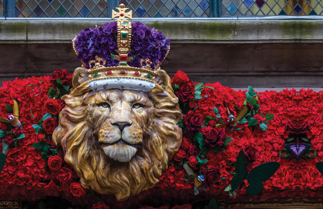 London, UK - April 30th 2023: The beautifully decorated exterior of The Ivy restaurant on West Street in London, to commemorate the Coronation of King Charles III.