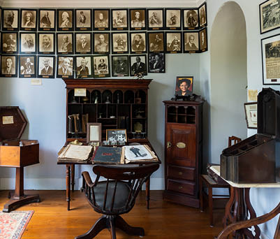 Sunbury, Barbados -2022: Sunbury Plantation House. Office, original desk and photos of Governor-Generals of Barbados, now with newly appointed President Sandra Mason. Prime minister Mia Amor Mottley.