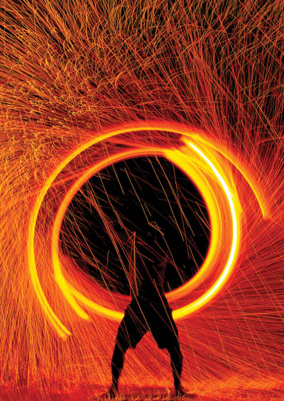 Fire dancers Swing fire dancing show fire show on the beach dance man juggling with fire , Koh Samet, Thailand