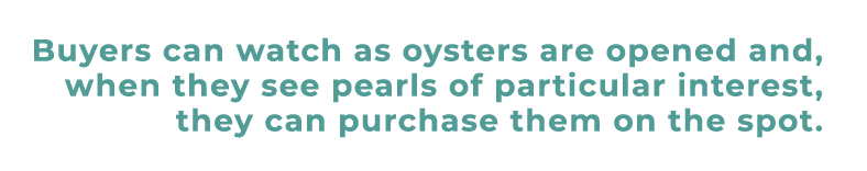 Buyers can watch as oysters are opened and, when they see pearls of particular interest, they can purchase them on th...