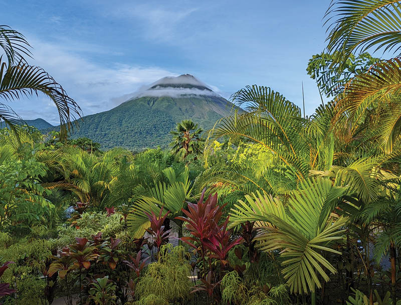 Arenal volcano in Costa Rica surrounded by jungle setting.