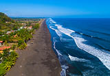 Aerial view of Playa Hermosa, Costa Rica. Volcanic sand beach with international reputation for surfing