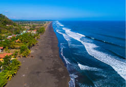 Aerial view of Playa Hermosa, Costa Rica. Volcanic sand beach with international reputation for surfing