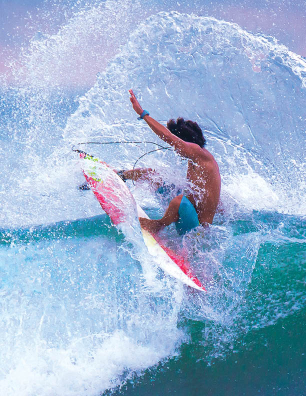 Riding the waves. Jaco Beach, Costa Rica, surf paradise