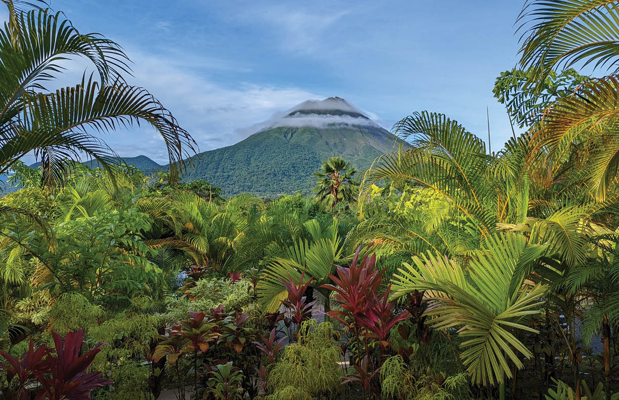 Arenal volcano in Costa Rica surrounded by jungle setting.