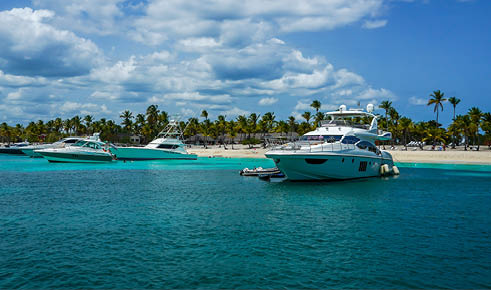 CATALINA ISLAND, DOMINICAN REPUBLIC - JUNE 13, 2021: Luxury yachts at Catalina Island or Isla Catalina. It is a tropical island located 1.5 miles from the mainland of the Dominican Republic