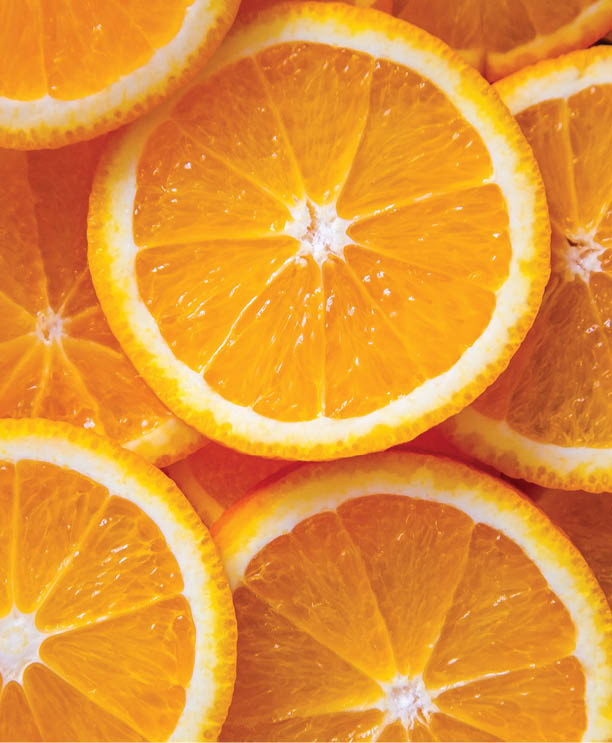 Abstract background with citrus-fruit of orange slices. Close-up