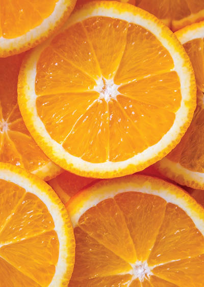 Abstract background with citrus-fruit of orange slices. Close-up