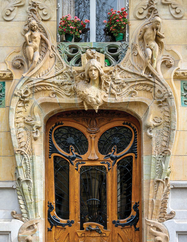 PARIS, FRANCE - APRIL 6: Door of the Lavirotte historical building from 1901, Art Nouveau architecture landmark on on April 6, 2024 in Paris, France