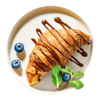 Freshly baked croissant with chocolate topping and blueberry on serving plate isolated on white background. Top view