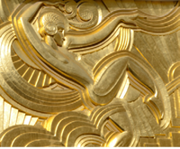 Paris, France - March 16, 2023: Ballerina golden relief on facade of Music Hall Cabaret Folies Bergere, In Par’s, France.