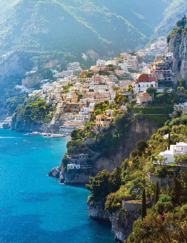 Morning view of Positano cityscape on coast line of mediterranean sea, Italy