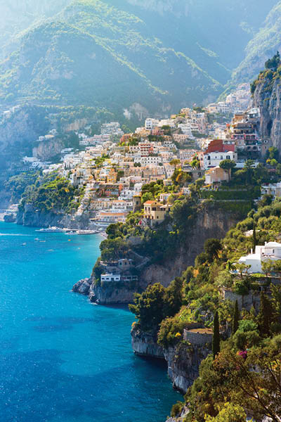 Morning view of Positano cityscape on coast line of mediterranean sea, Italy