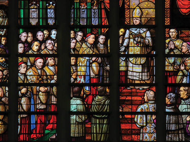 Stained Glass in Mechelen Cathedral of the promulgation of the papal bull Ineffabilis Deus, defining the dogma of the Immaculate Conception, by Pope Pius IX in 1854.