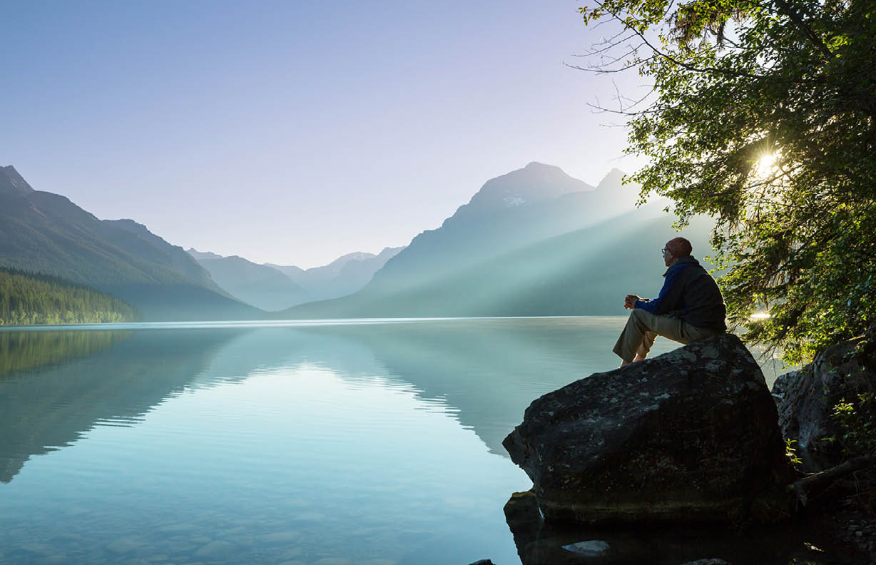 Beautiful Bowman lake with reflection of the spectacular mountains in Glacier National Park, Montana, USA.
