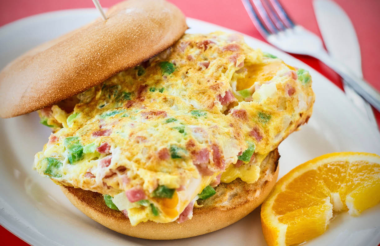 denver omlette served as a bagel sandwich