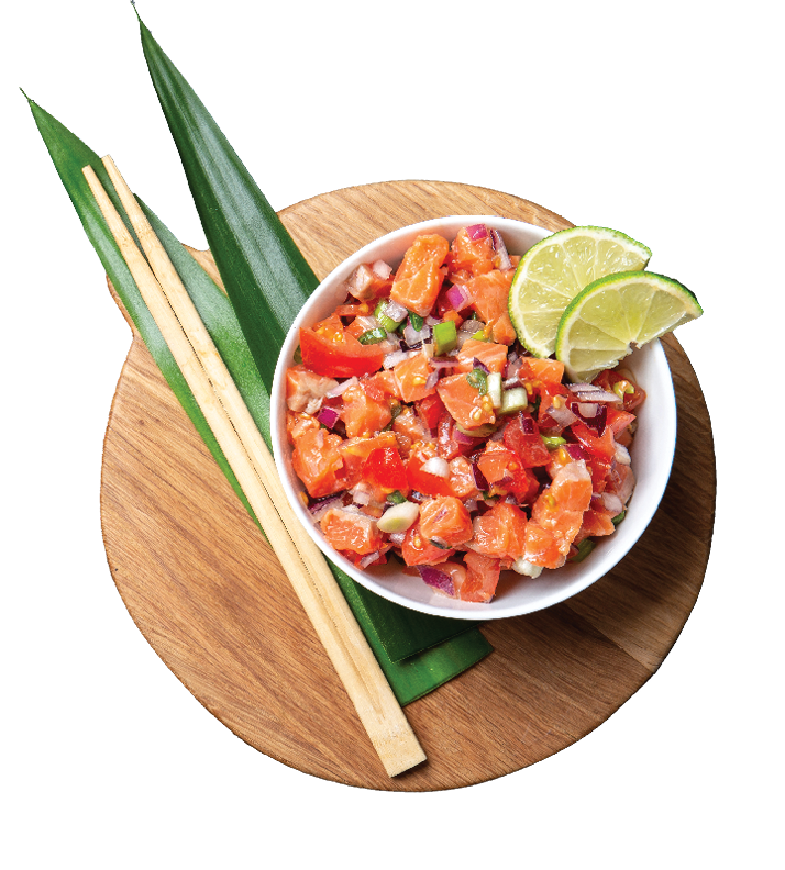 Lomi lomi salmon, hawaiian raw salmon salad on blue background