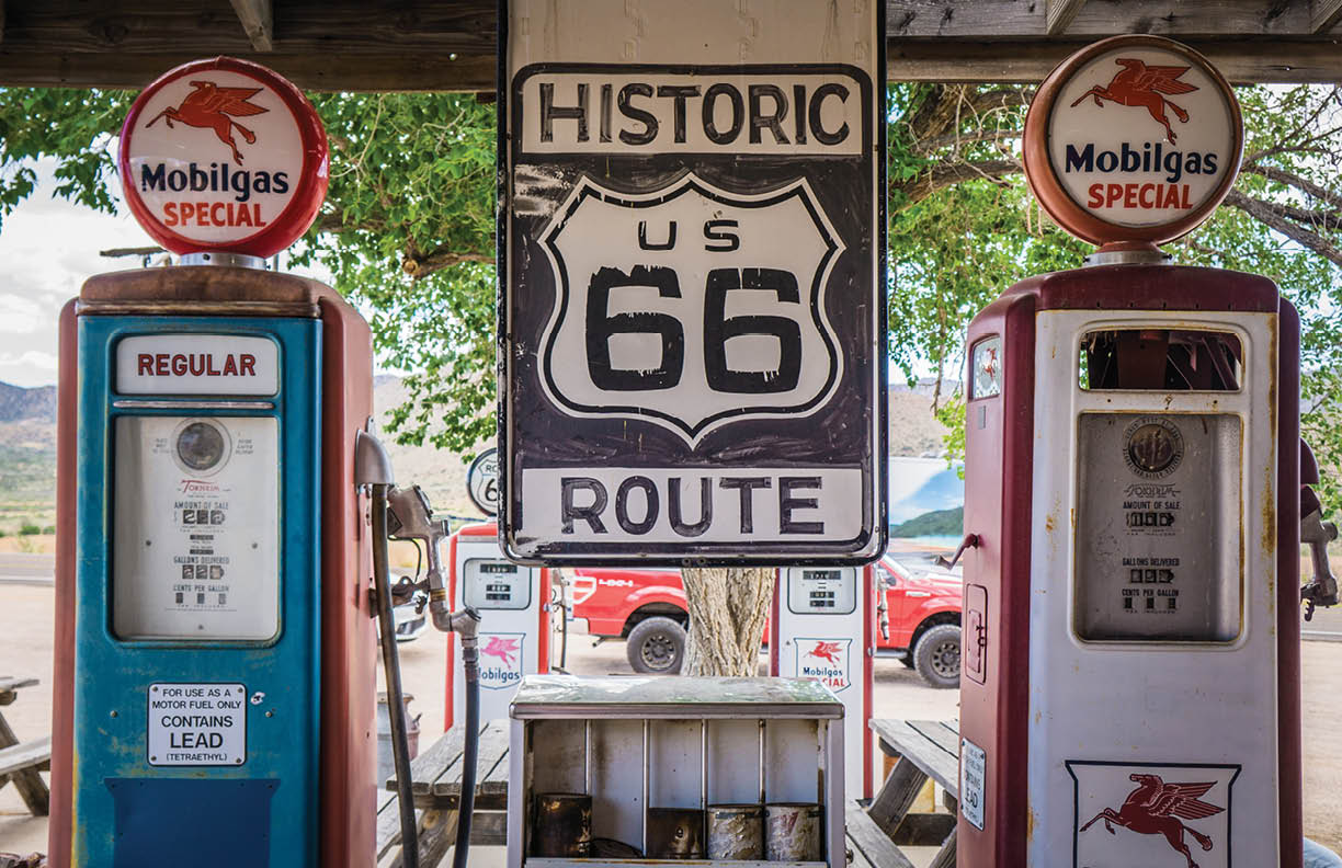 Kingman, Arizona, USA - May 14th 2019: Hackberry General Store, famous stop on the historical road 66. Antique Gas pumps and historical route 66 sign