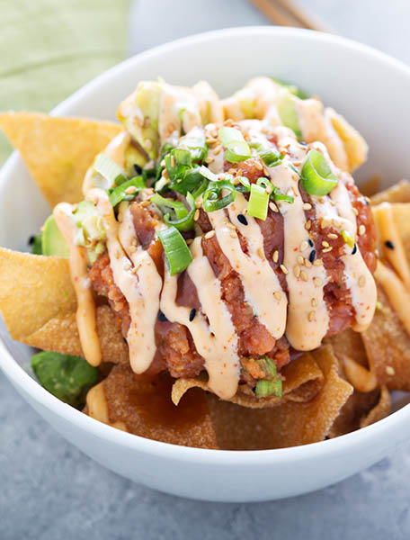 Poke bowl nachos style with fried wonton wrappers