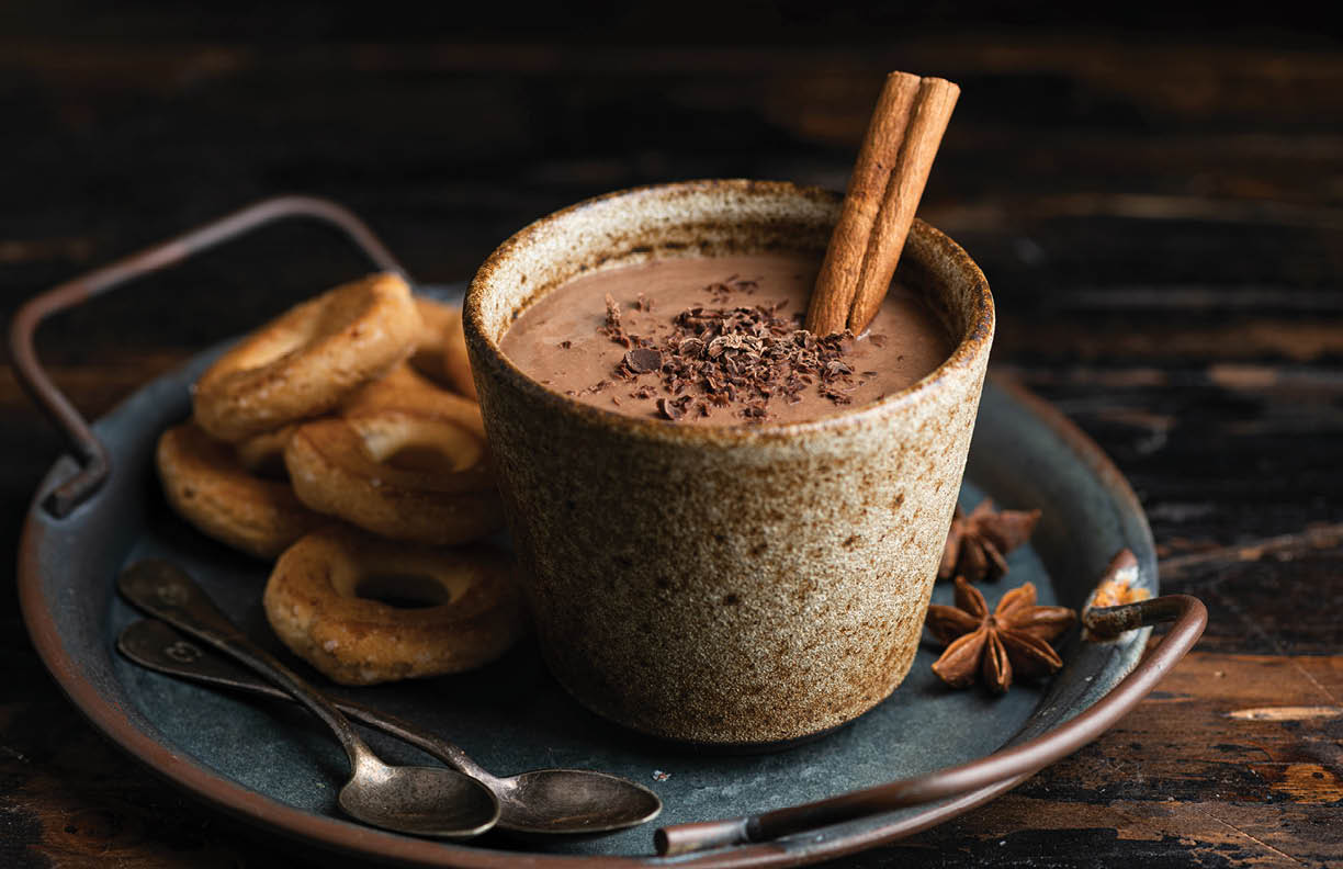Champurrado, traditional mexican corn drink with chocolate, selective focus