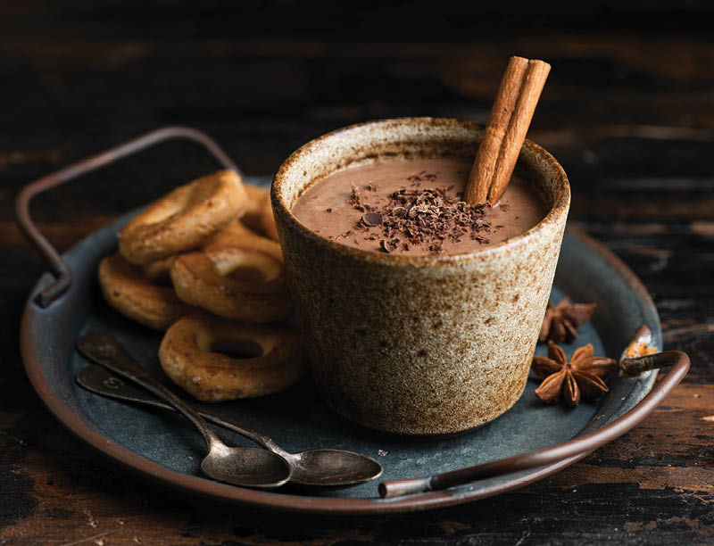 Champurrado, traditional mexican corn drink with chocolate, selective focus