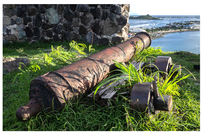 An old cannon on Fort Louis overlooks the harbour at Marigot, on the French side of the island of St Martin