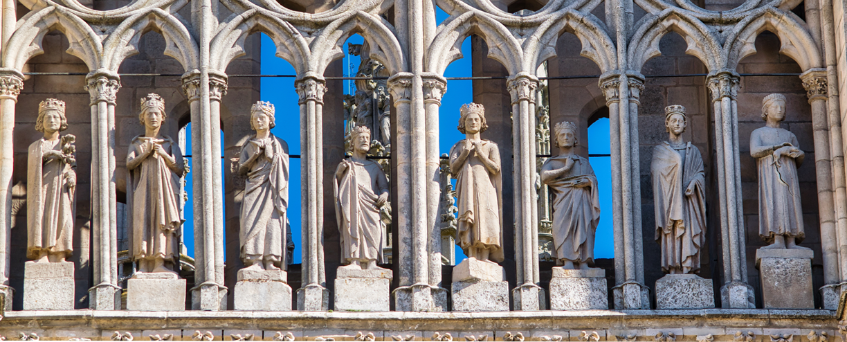 Statues of the first eight kings of Castile on the main facade of the Gothic cathedral of Burgos, Spain