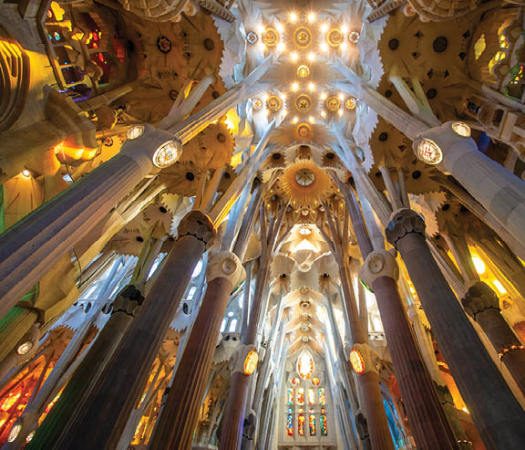 Barcelona, Spain - May 9, 2024: Interior of La Sagrada Familia cathedral, designed by Gaudi, it is being built since 1882.