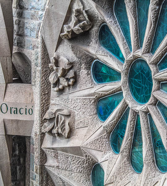 Barcelona, Spain - April 19, 2017: Facade of the Cathedral of Sagrada Familia. Church in the Eixample district, built on private donations since 1882; famous project by Antonio Gaudi