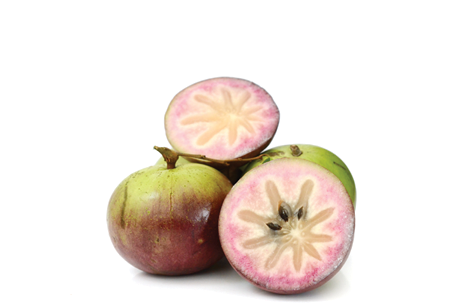 Ripe star apple fruit isolated on white background