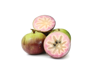 Ripe star apple fruit isolated on white background
