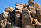 Rock climbers in Joshua Tree National Park,in Hidden Valley. March, 2012. 