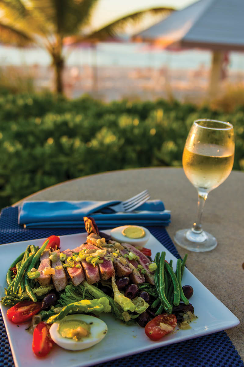 Grilled tuna cuisine, Grace Bay Beach, Providenciales, Turks and Caicos Islands, Caribbean.