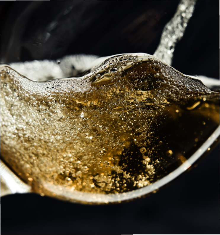 White wine being poured into a wineglass. 